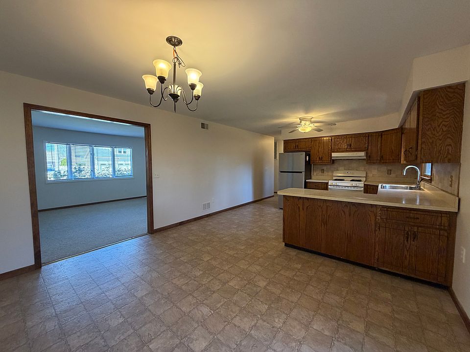 Dining room looking to living room and kitchen