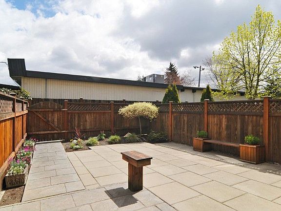 This patio view is from the front door and office window. Especially perfect if you work from home.