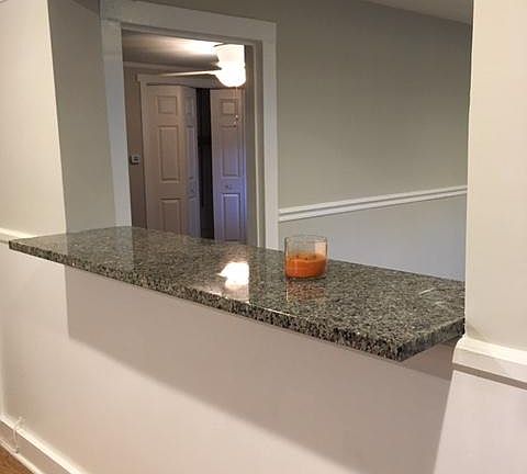 Breakfast bar looking into bedroom