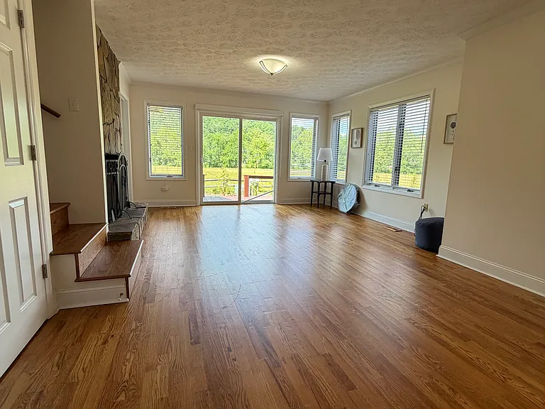 Family Room with sliding glass door looking out to the deck.