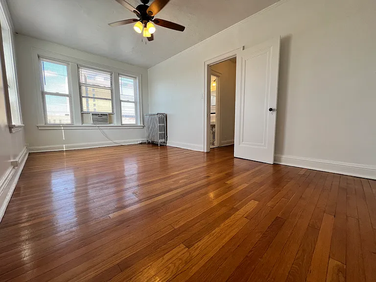 Hardwood flooring throughout in excellent condition.