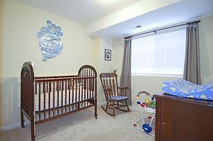 Lower level bedroom with big window