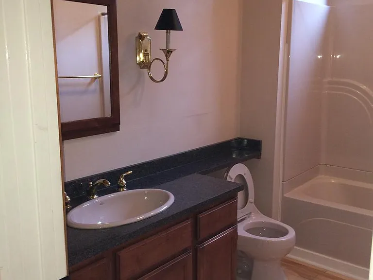 full bath downstairs. New faucets and fixtures have been installed since this photo.