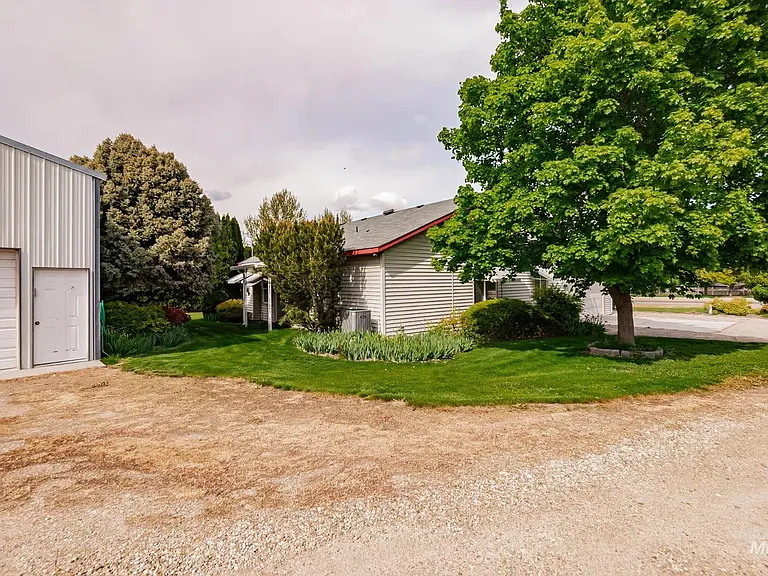 detached garage not included.