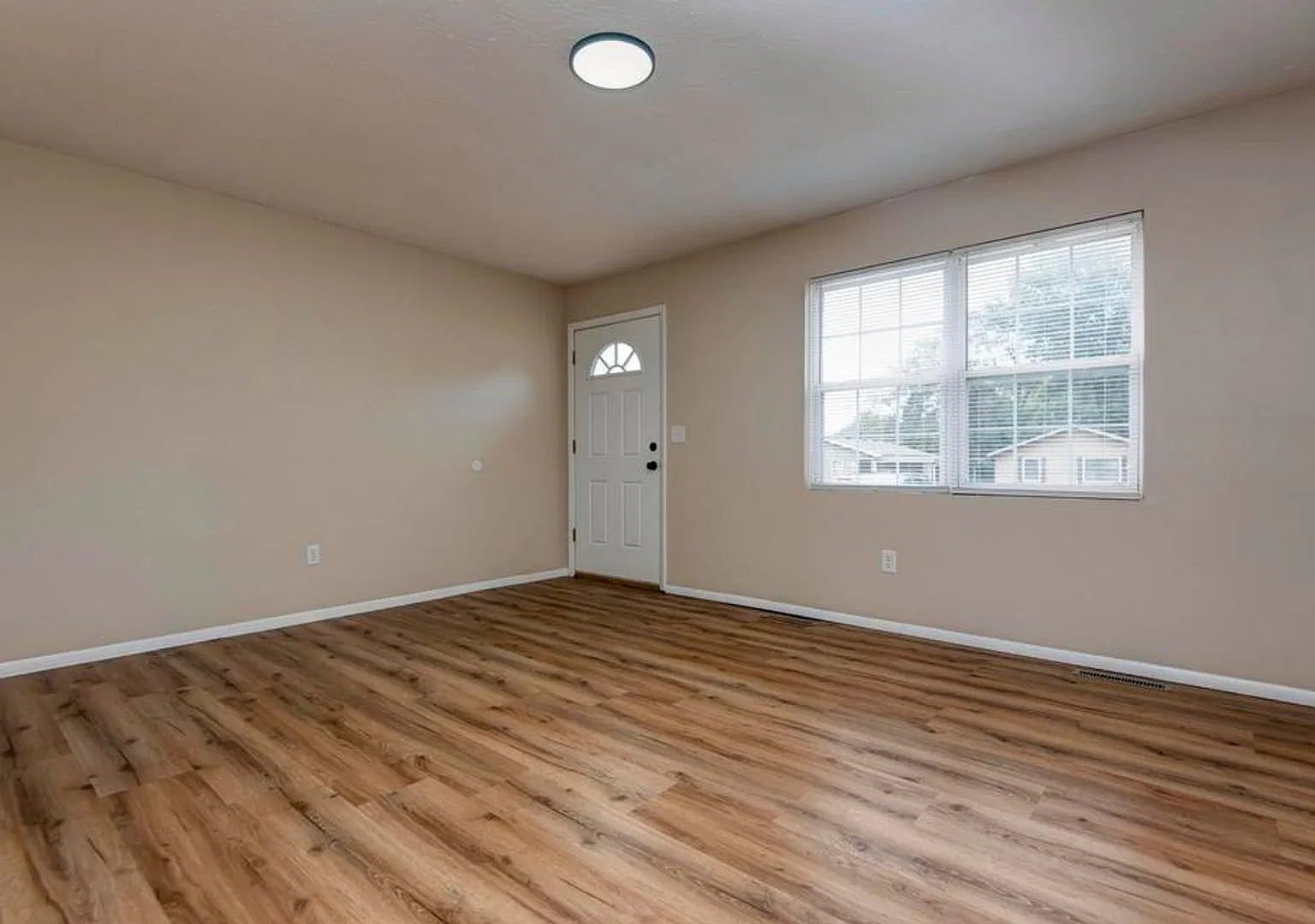 Cozy 3-Bedroom Home with Convenient Layout — Photo 3