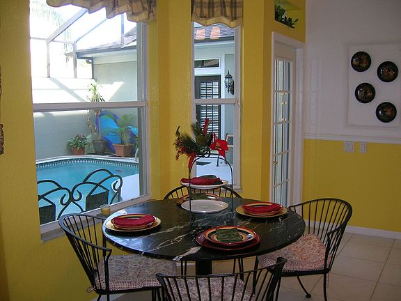 Eat in Kitchen overlooking private courtyard and shimmering pool