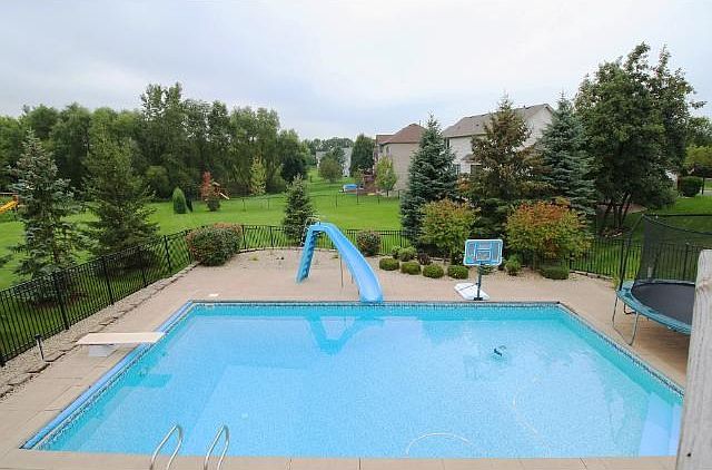 Relax in the 36' x 18' heated pool with perfect nature views.  Low maintenance and a new safety pool cover plus an auto cleaner and chlorinator