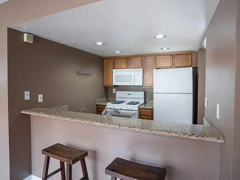 View over the sink and into the kitchen