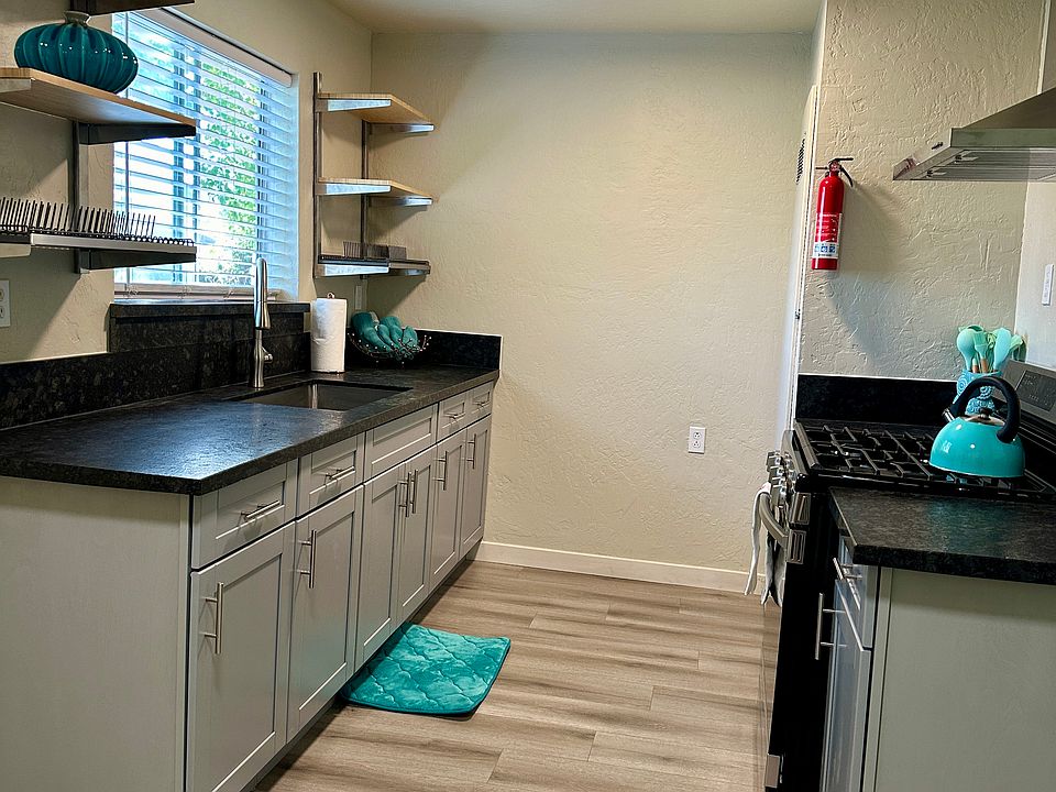 New granite countertops, LED ceiling lights. Very large kitchen window with a granite windowsill.