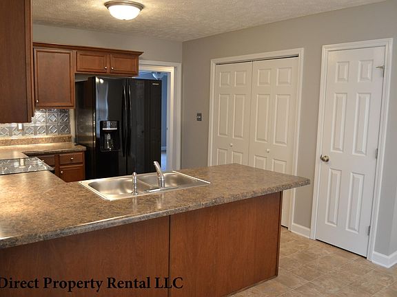 Laundry and Pantry Closet located in Kitchen