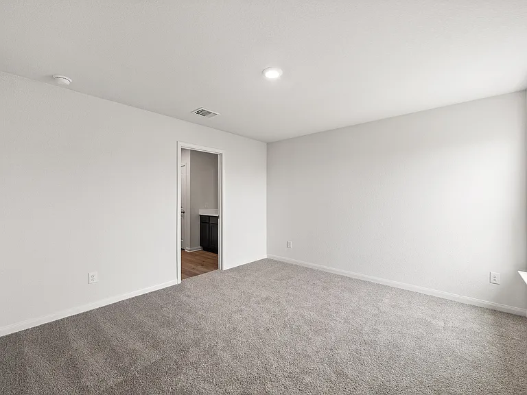 The master suite has a bedroom, ensuite bathroom and walk-in closet.