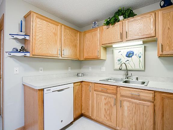 The kitchen has an abundance of storage and also features solar tubes letting in lots of natural light!