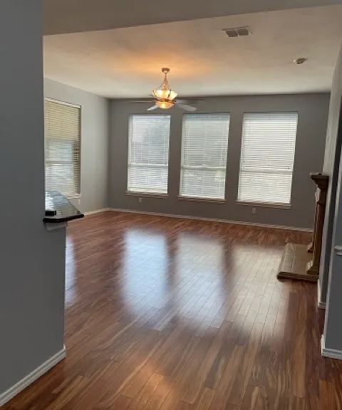 Living room. Great lighting. Ceiling fan.