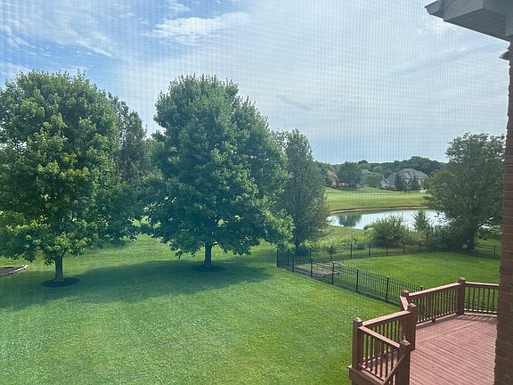 Another golf course view with a pond_from the deck.