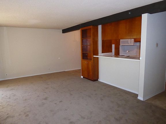 Living room looking toward kitchen