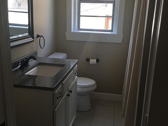 Apt C Bathroom: New plumbing, new cabinets, flooring