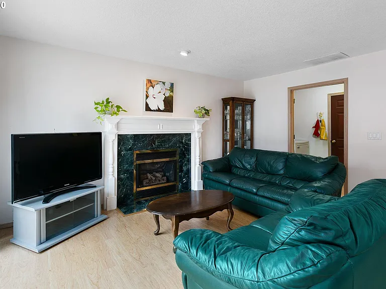 Living room with furniture with access to back yard sliding door