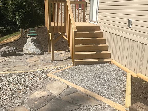 Front deck, sidewalk and patio