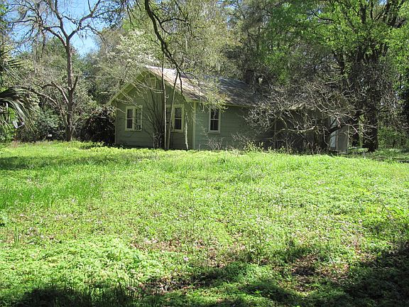 Backyard and North Side Yard Showing Trees
