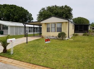 257 Dolphin Cir, Barefoot Bay, FL 32976