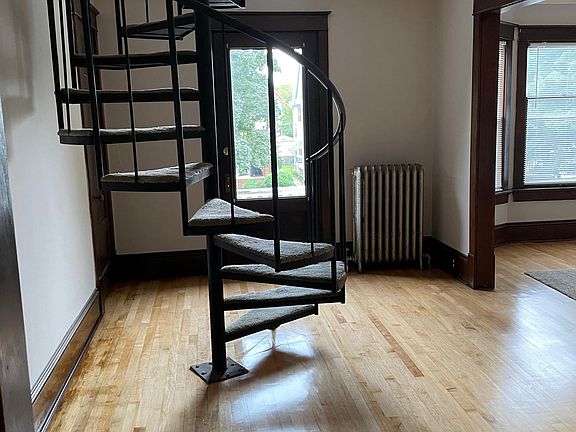 spiral staircase to loft. There is also a second entrance to the loft via the back staircase.
