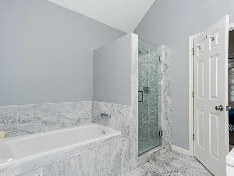 Soaking tub and glass shower