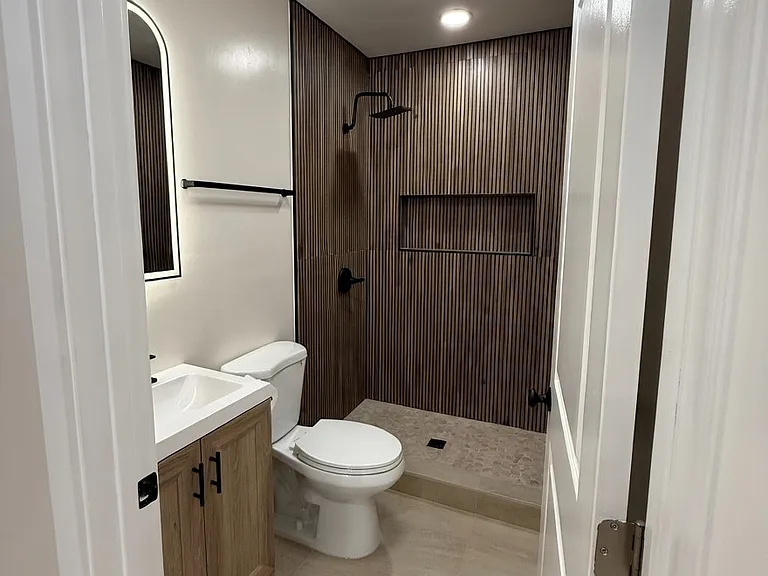 Well appointed bath with step in shower