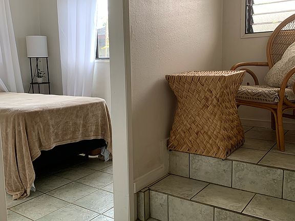 Entrance to room with hallway bicycle parking