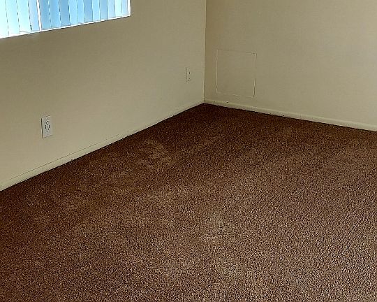 Bedroom with carpet