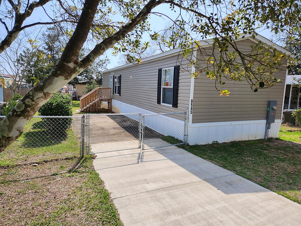 Fenced yard and parking.