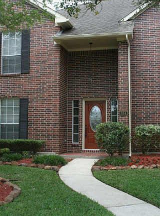 Beautiful new leaded glass front door in this grand entry