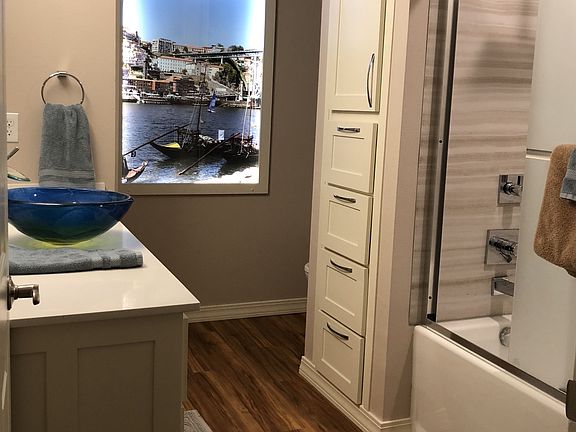 Full bathroom with shower and tub. Lots of storage space.