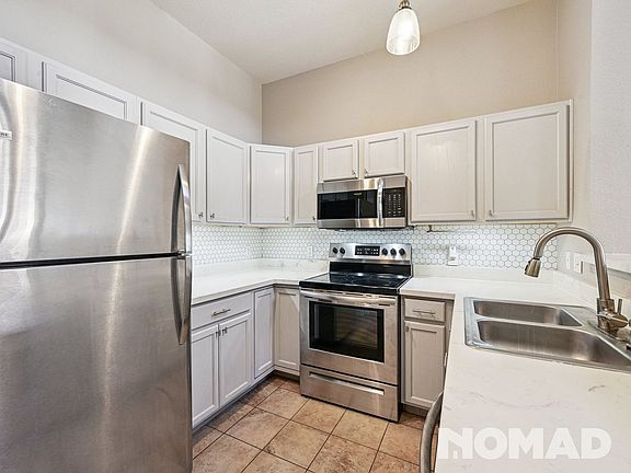 5th image of 8707 E Florida Ave Unit 604