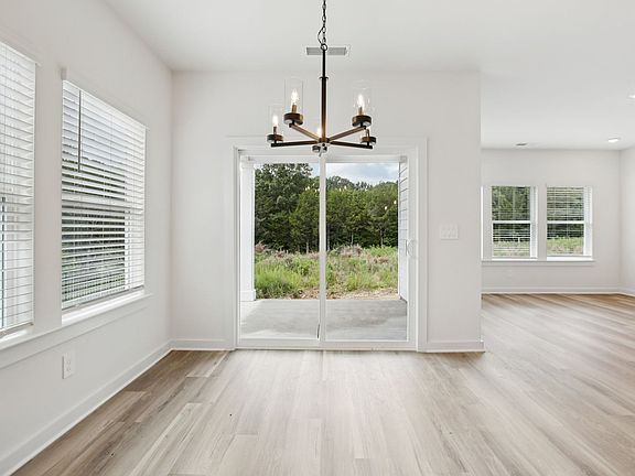 The open-concept floorplan allows for an easy flow between the kitchen and dining areas.