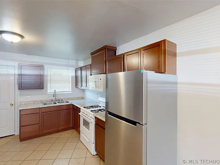 13858 S 292nd East Ave #C — Photo 4