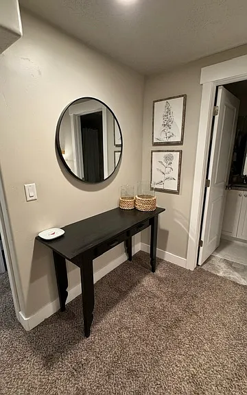 basement main room outside private bathroom