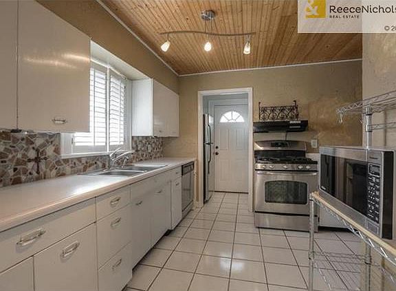 Nicely updated kitchen and all SS appliances stay!