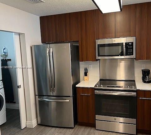 4th image of 14501 Grove Resort Ave #2129