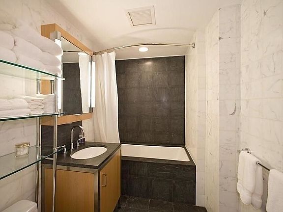 5th image of 100 W 58th St APT 3A