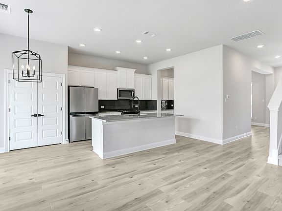 The kitchen has a convenient kitchen island.