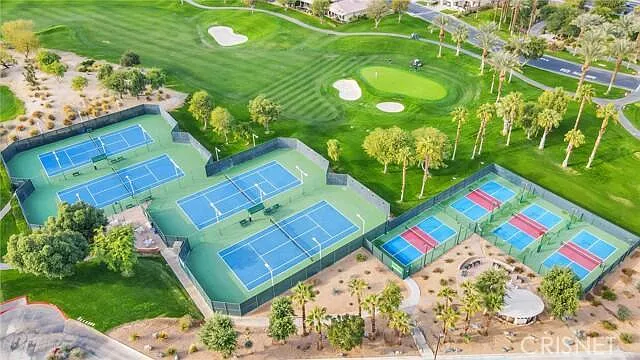 Aerial view of pickleball /tennis courts and golf course