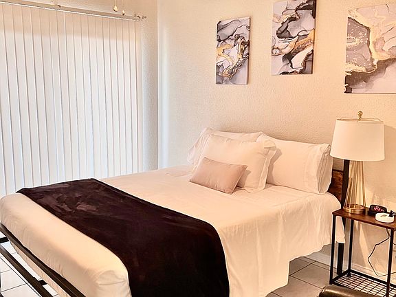 Full sized bedroom with queen size bed and smart television with free Netflix.