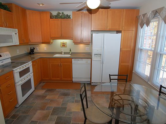 Updated Kitchen with Corian counter tops.
