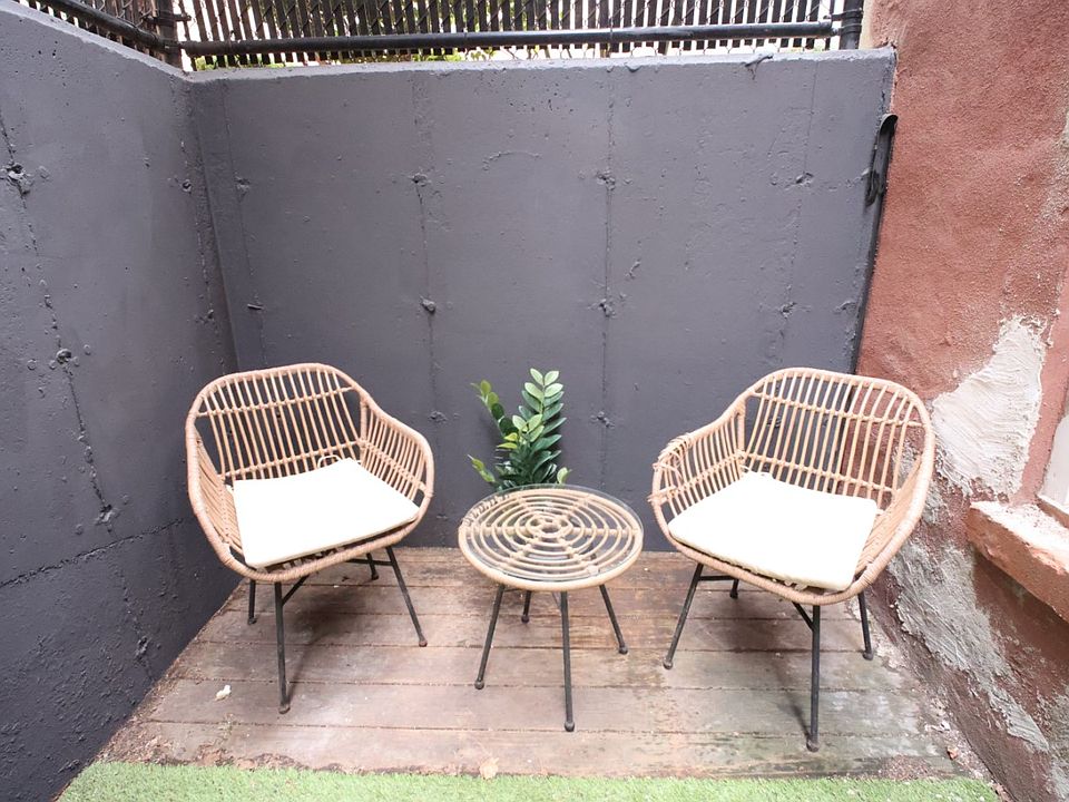 Private and secluded back patio area perfect size for small gatherings, pets, or just to relax and BBQ!