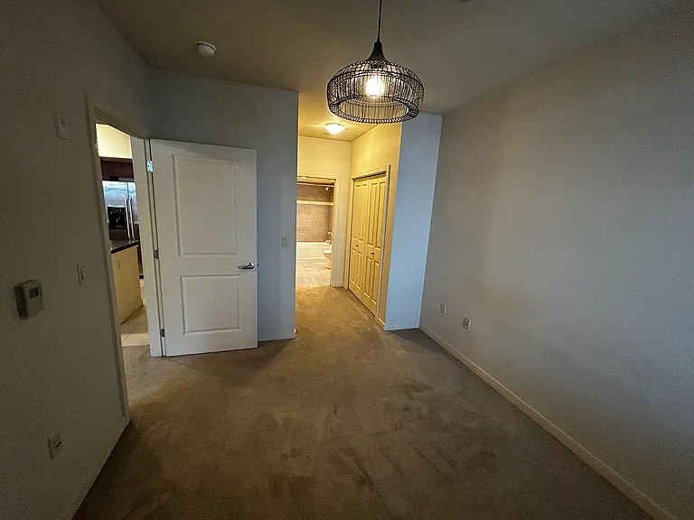 Looking from bedroom towards bathroom. Note the bathroom has two entrances - this one looks into the bathroom through the bedroom side.