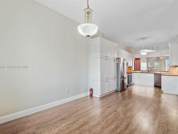 5th image of 7592 Granville Dr #411