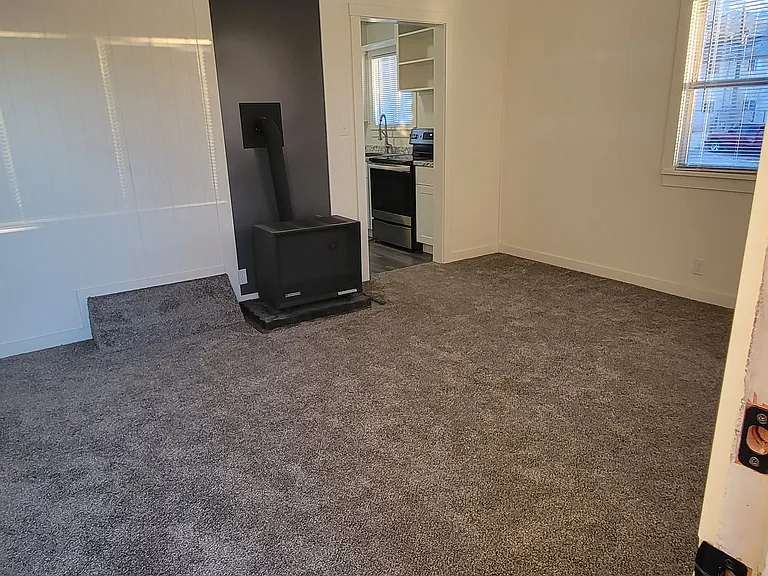 Front door open to living room