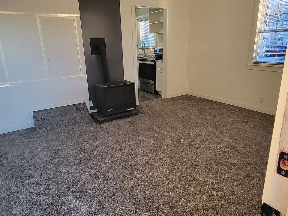 Front door open to living room