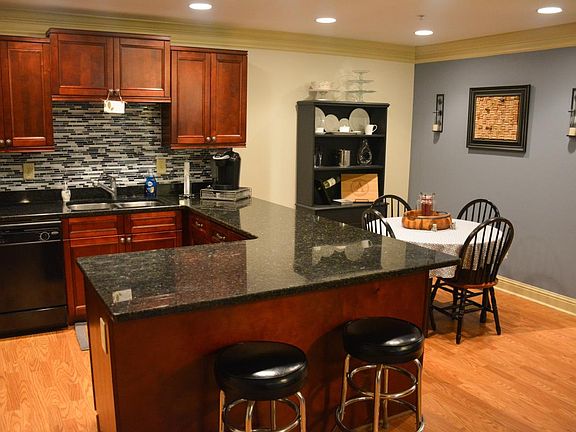 Large kitchen with granite counter tops