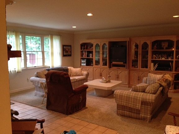 Family Room
						:
						Oversees back yard with access to patio
Fireplace-Peek through to Kitchen